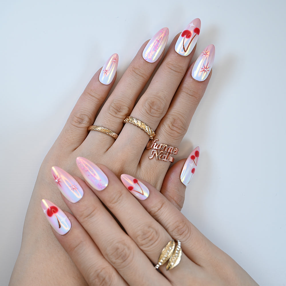 Medium almond shaped press on nails featuring red cherry art and holographic shimmer by Charmeenail