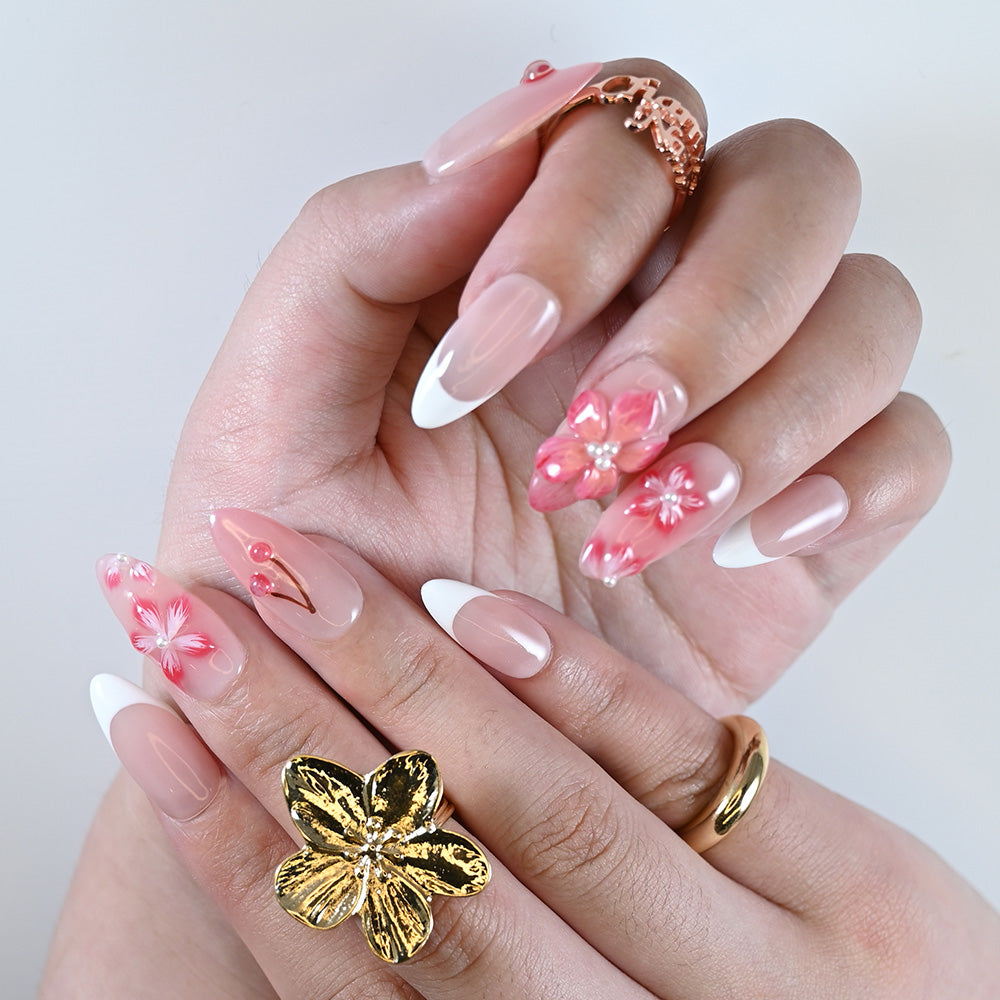 Bridal-ready press on nail set with soft floral art, white tips, and elegant gold rings