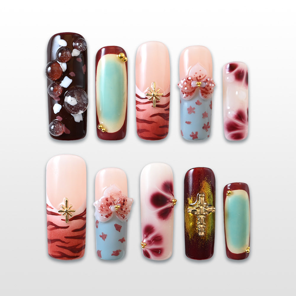 Handmade burgundy and pastel blue press on nails with floral and cross charms