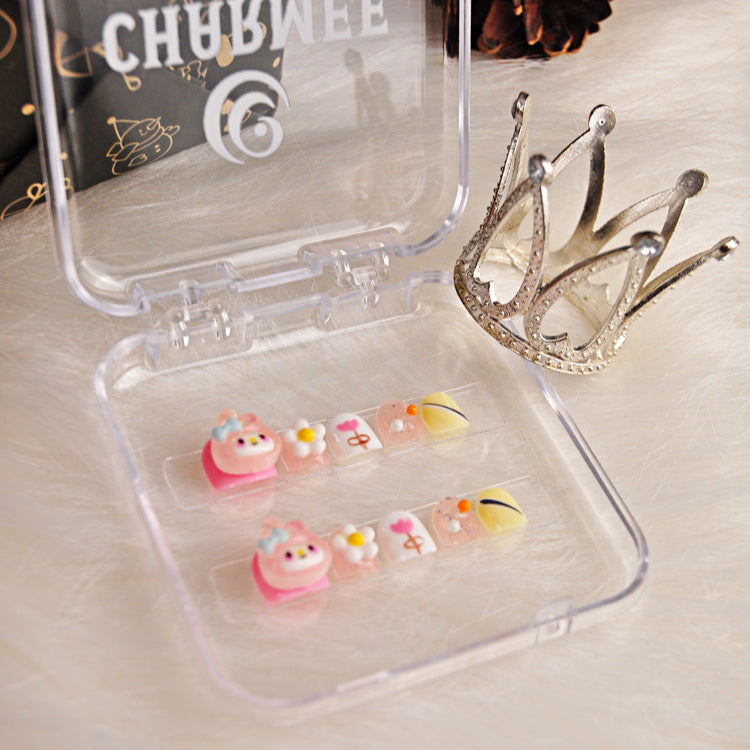 Cute kawaii nails with My Melody charm, floral patterns, and soft yellow tips