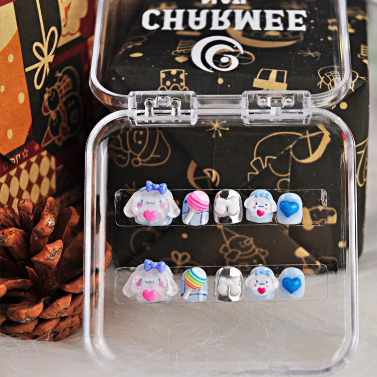 Playful kawaii nails with 3D bunny face, rainbow candy, and bright heart charm