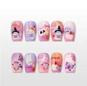 Pastel Halloween press on nails with cute ghost and pumpkin design
