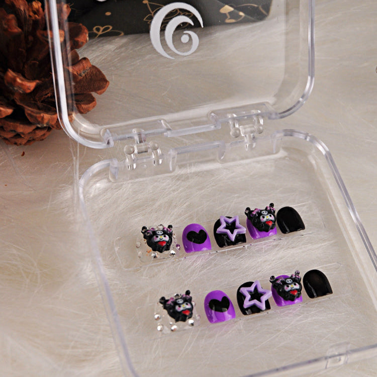 Cute Sanrio-inspired nails with purple hearts, 3D Kuromi, and black polish