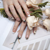 Minimalist star-themed press-on nails with crystal studs