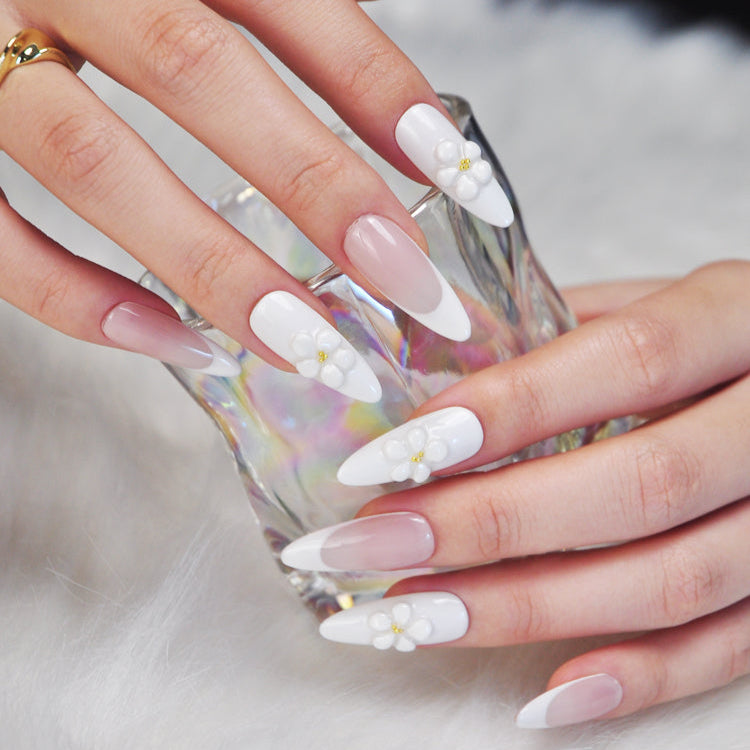 Classy French manicure press-on nails with soft nude tones and floral details