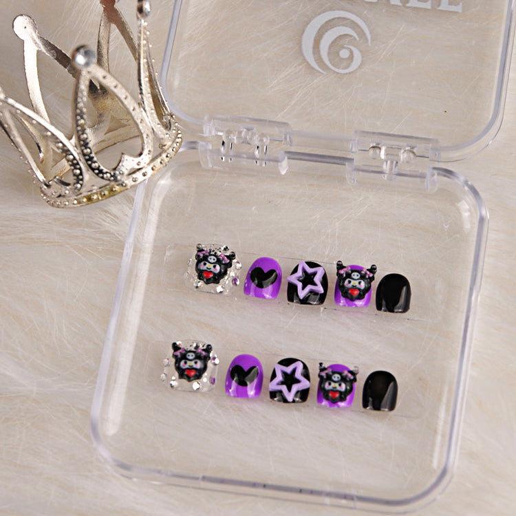 Handmade kawaii nails featuring Kuromi face, glitter accents, and star patterns