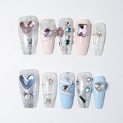 Pink and silver glitter press-on nails with 3D heart gem and rhinestone accents
