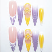 Purple and yellow press-on nails with 3D flower and water droplet details