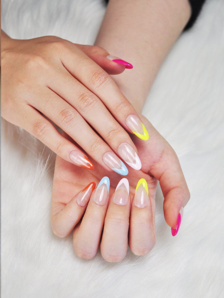 Trendy almond nails featuring bold colorful French tips for a playful summer look