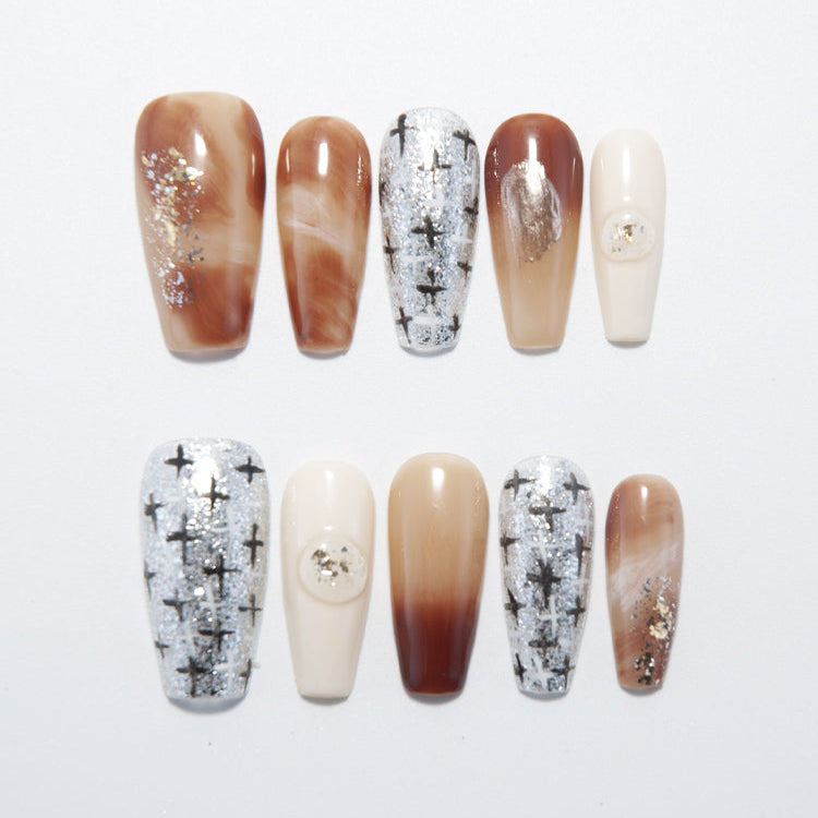 Brown marble press-on nails with silver glitter cross pattern