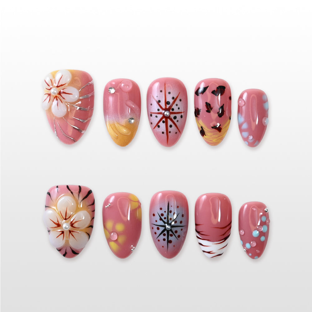 Handmade almond nails with pearl accents and dot art