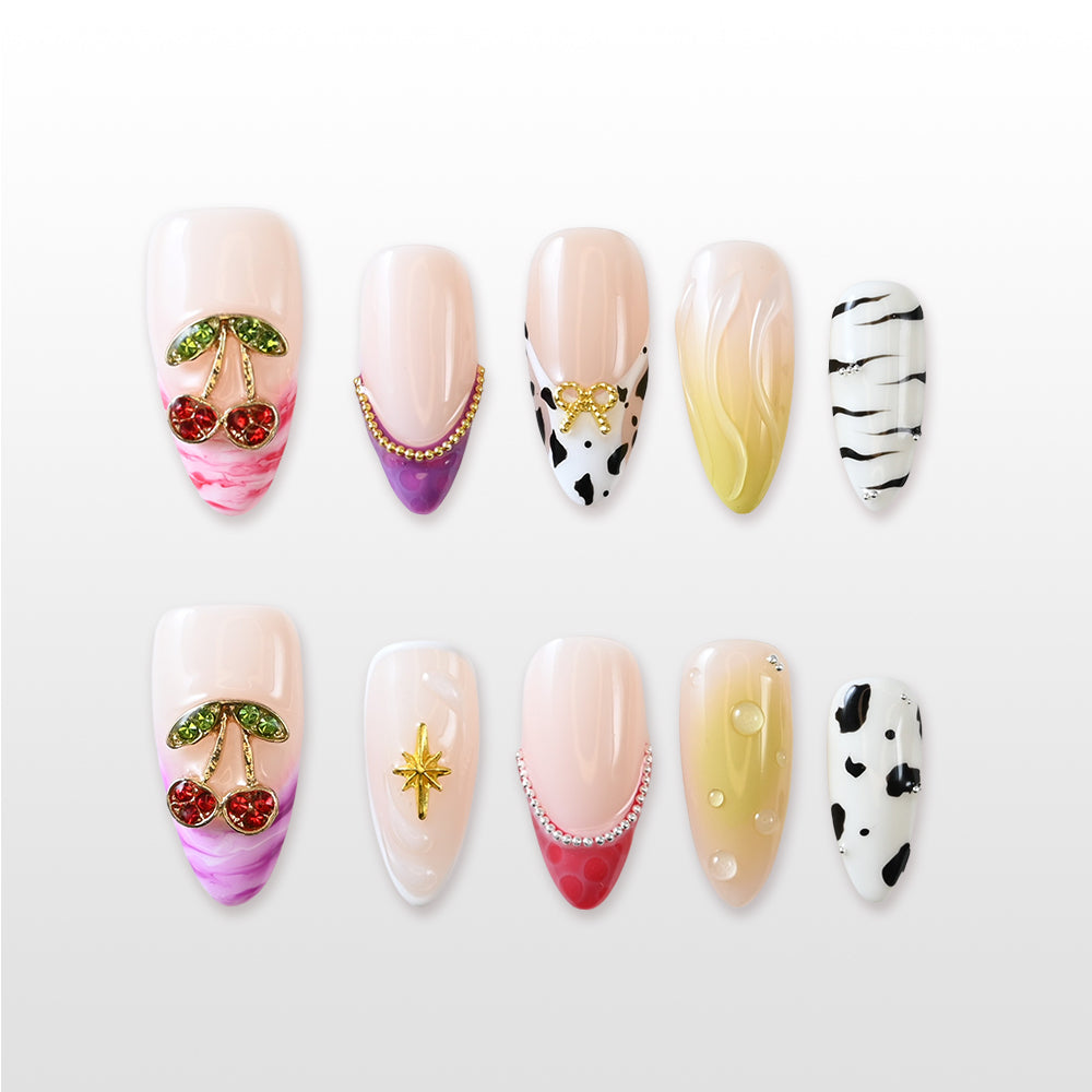 Colorful almond press-ons featuring pink and green gradients, animal prints and 3D embellishments