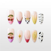 Colorful almond press-ons featuring pink and green gradients, animal prints and 3D embellishments