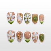 Charmeenail spring green press on nails with white daisy flowers and gold foil accents