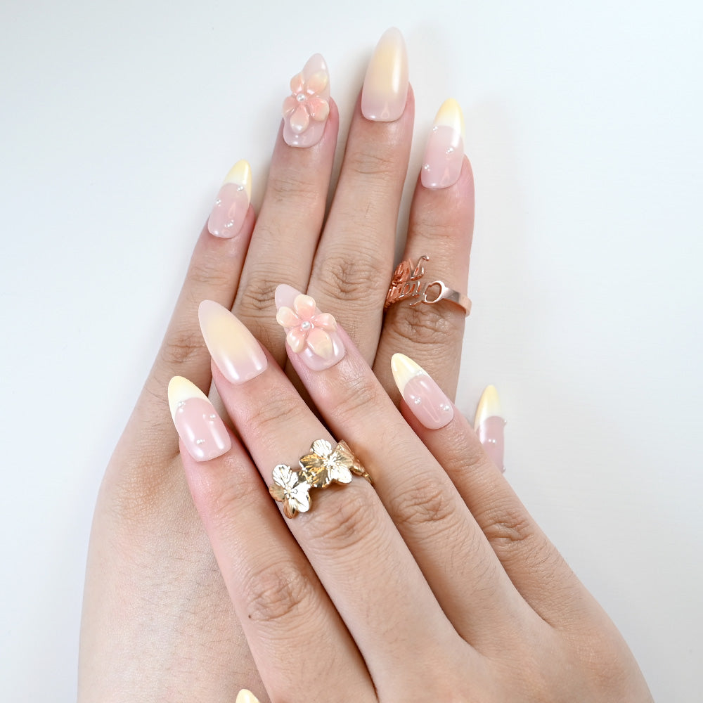 Reusable press-on nails with elegant pearls and pastel flower charm