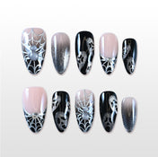Handmade black and silver press on nails with 3D spider and web design