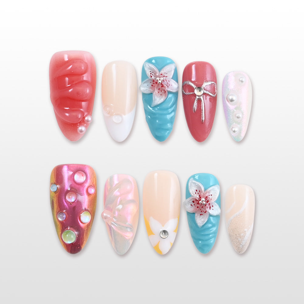 Coral and turquoise press-on nails with 3D lily flowers and pearl accents