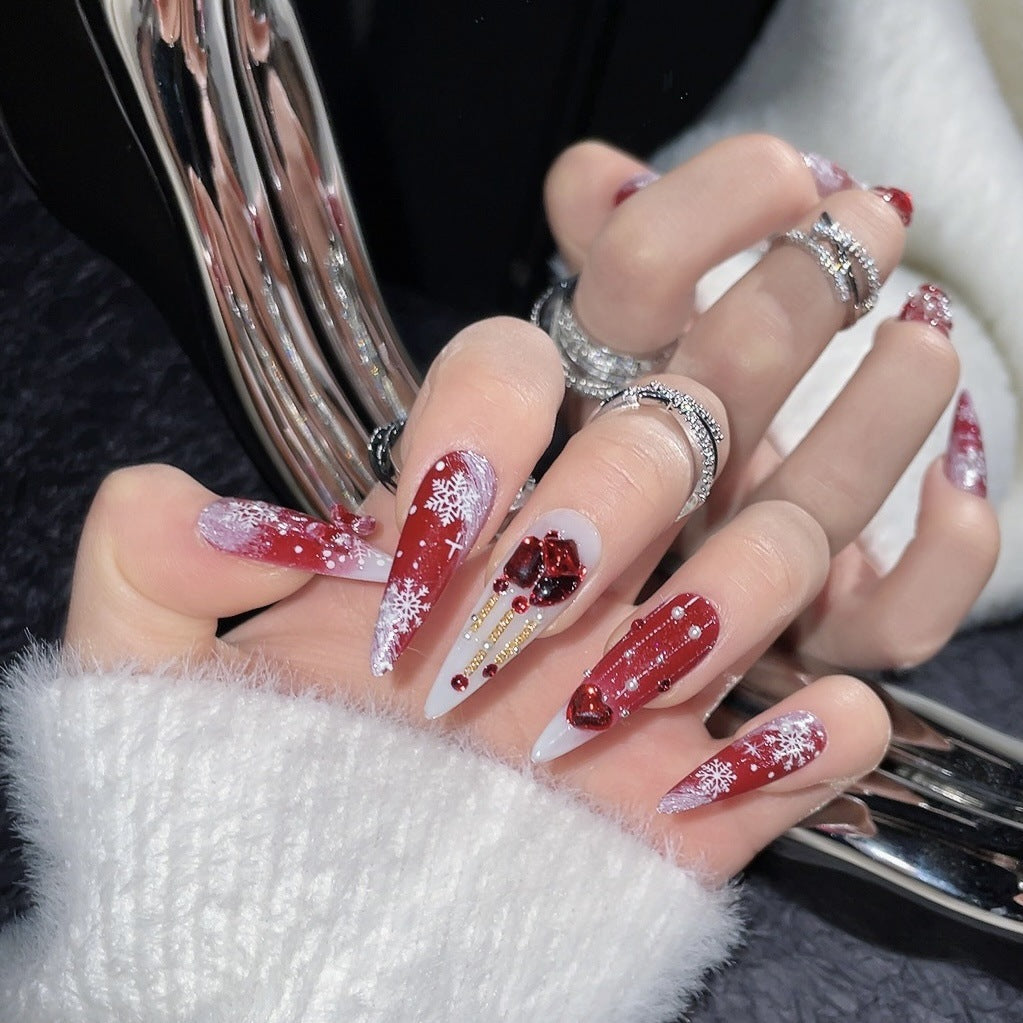 Charmeenail Christmas nails with snowflake and gemstone heart detail