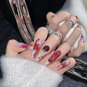Charmeenail Christmas nails with snowflake and gemstone heart detail