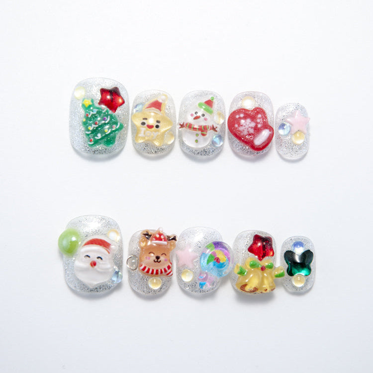 Short Christmas press-on nails with 3D Santa, reindeer, and Christmas tree charms