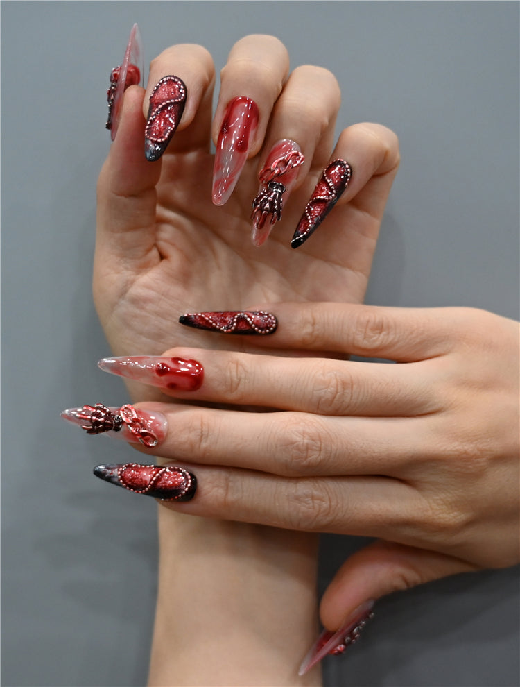 Halloween gothic nails with edgy skeleton, pearls, and rose details