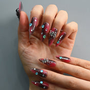Handmade almond nails with spider web design and black red ombre