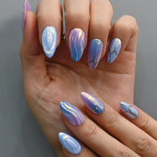 Sci-fi press-on nails with holographic shine and unique swirl art
