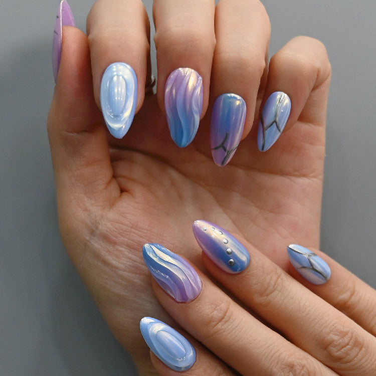Sci-fi press-on nails with holographic shine and unique swirl art