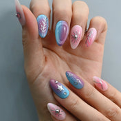 Handmade nails with bow, star, and spider design in pastel gradient