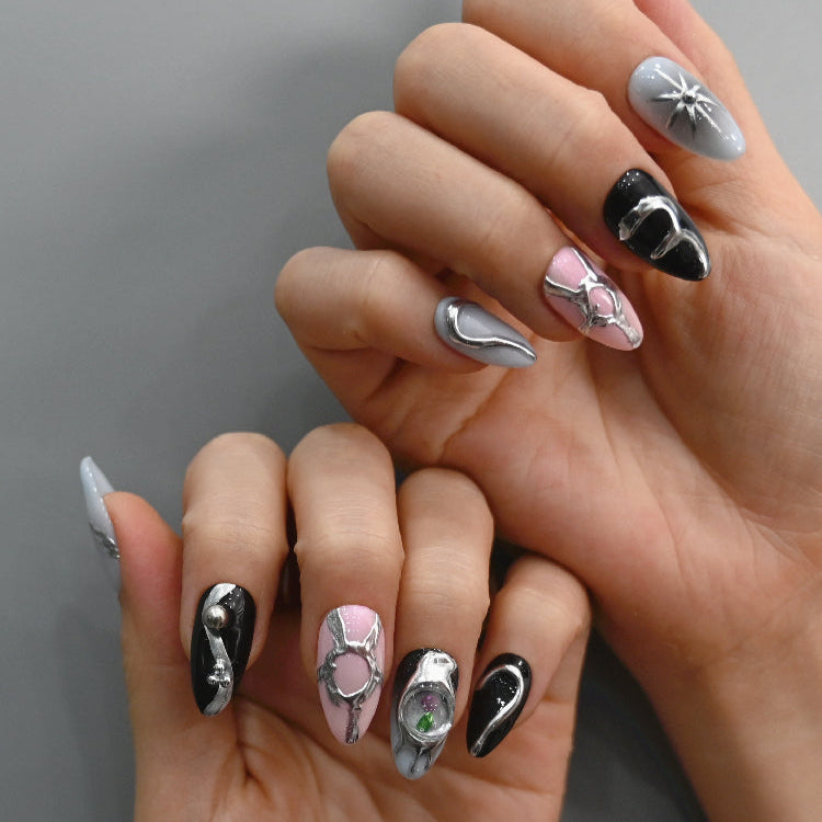 Galaxy-inspired press-on nails with crystal orb and cosmic star patterns