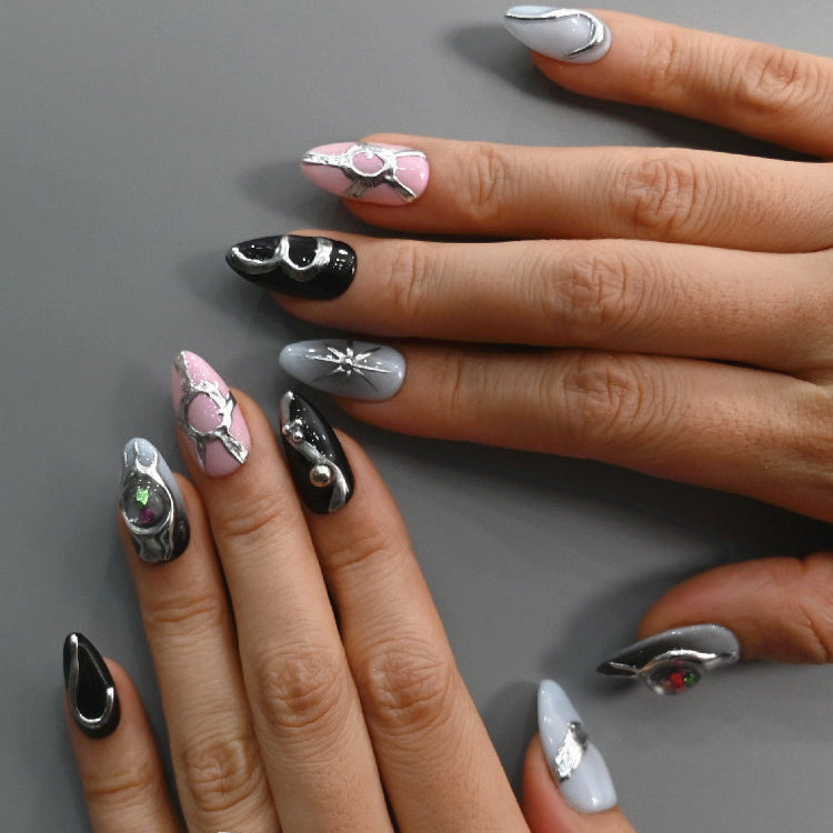 Abstract handmade nails with holographic stones and silver sculpted art