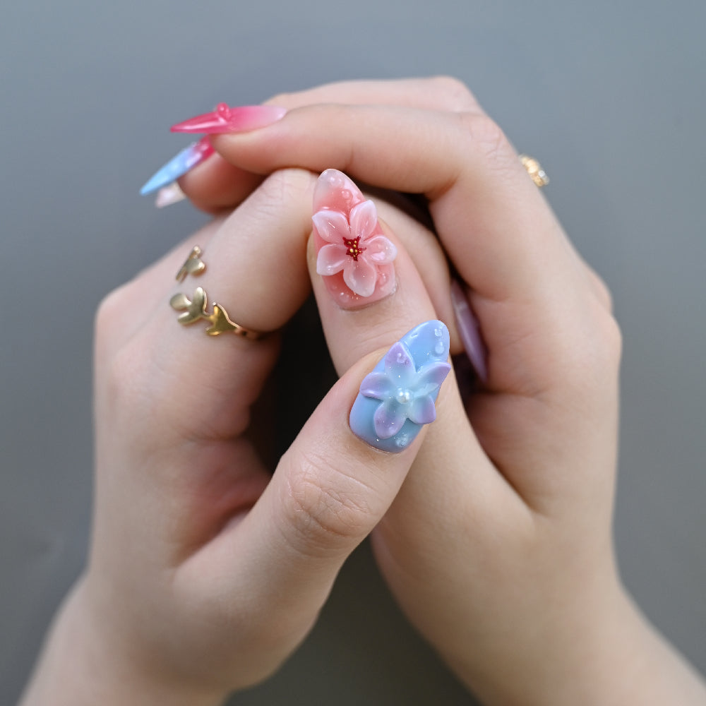 Summer press-on nails with tropical flower patterns and glossy finish