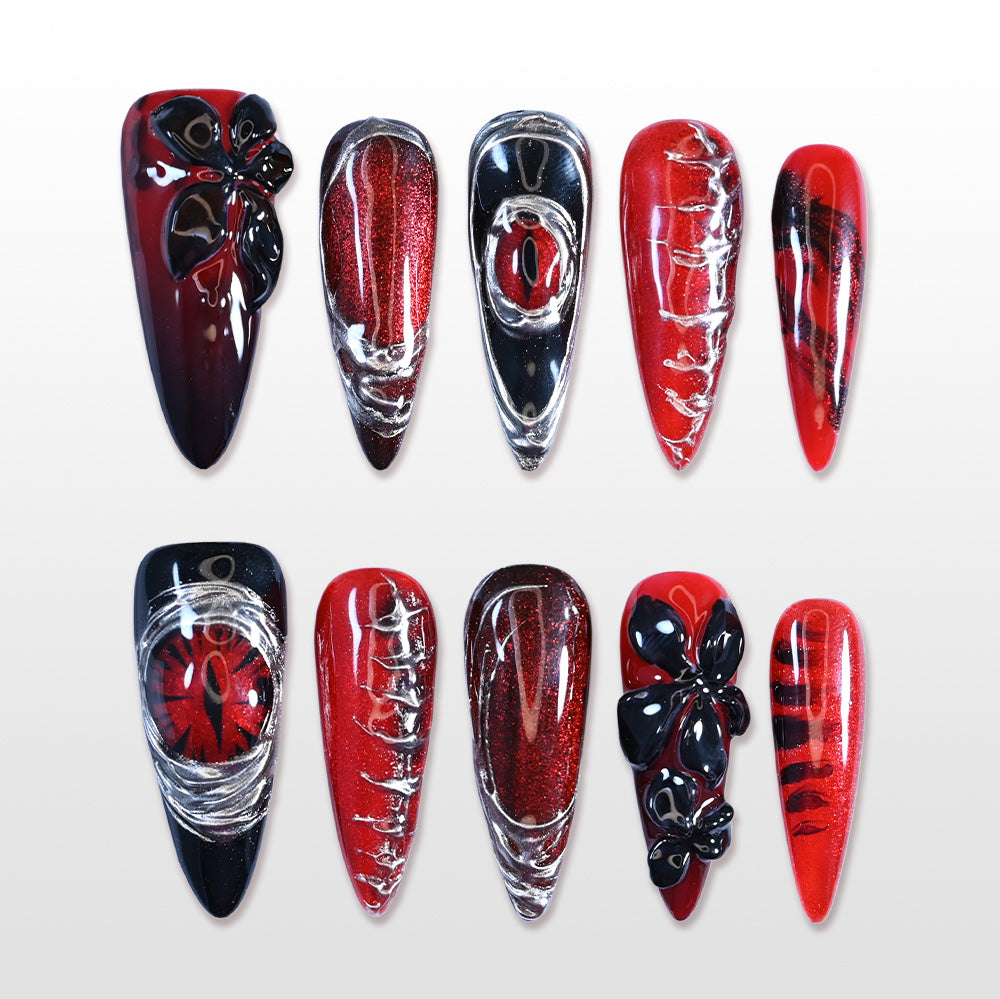 Handmade red and black press on nails with 3D bow and metallic scar design