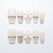 Short square cream handmade press-on nails with silver glitter tips and crystal embellishments