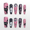 Handmade pink and black Halloween press on nails with ghost, black cat, spider and BOO design