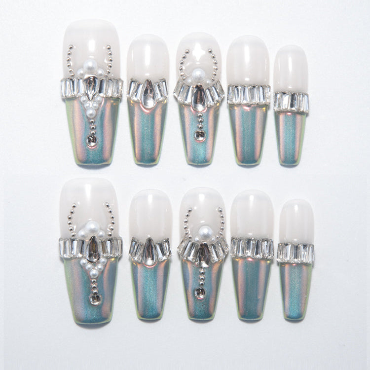 White and chrome gradient press-on nails with pearl and crystal embellishments