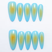 Blue to yellow gradient press-on nails inspired by tropical beaches